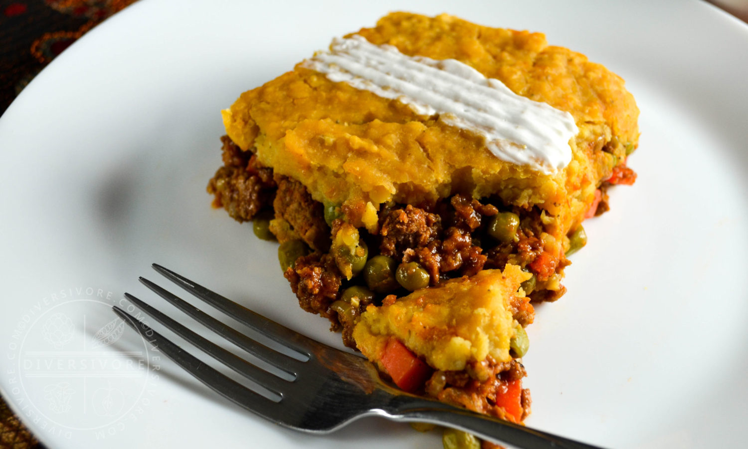 Indian spiced shepherd's pie with lamb and mashed red lentils in place of the more familiar potato topping - Diversivore.com