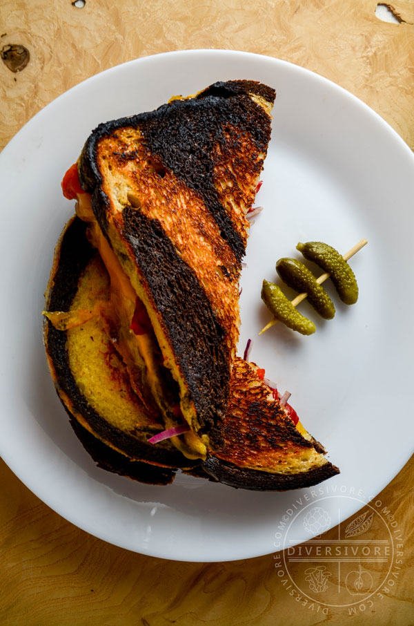 Pickled Pepper Grilled Cheese on marble rye with cornichons