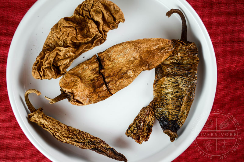 An assortment of chipotle meco chilies in a small white bowl