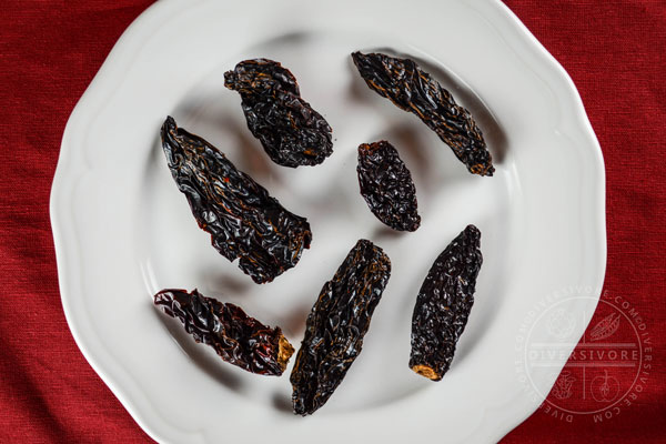 Morita chipotle chilies on a white plate