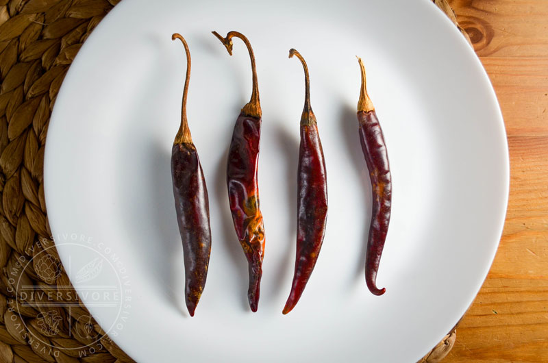 Four puya chilies on a plate