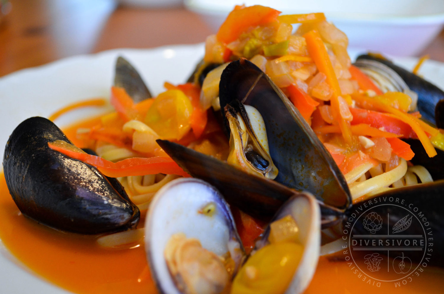 San Diego Mussel and Clam Linguine with coconut milk and squash blossoms - Diversivore.com