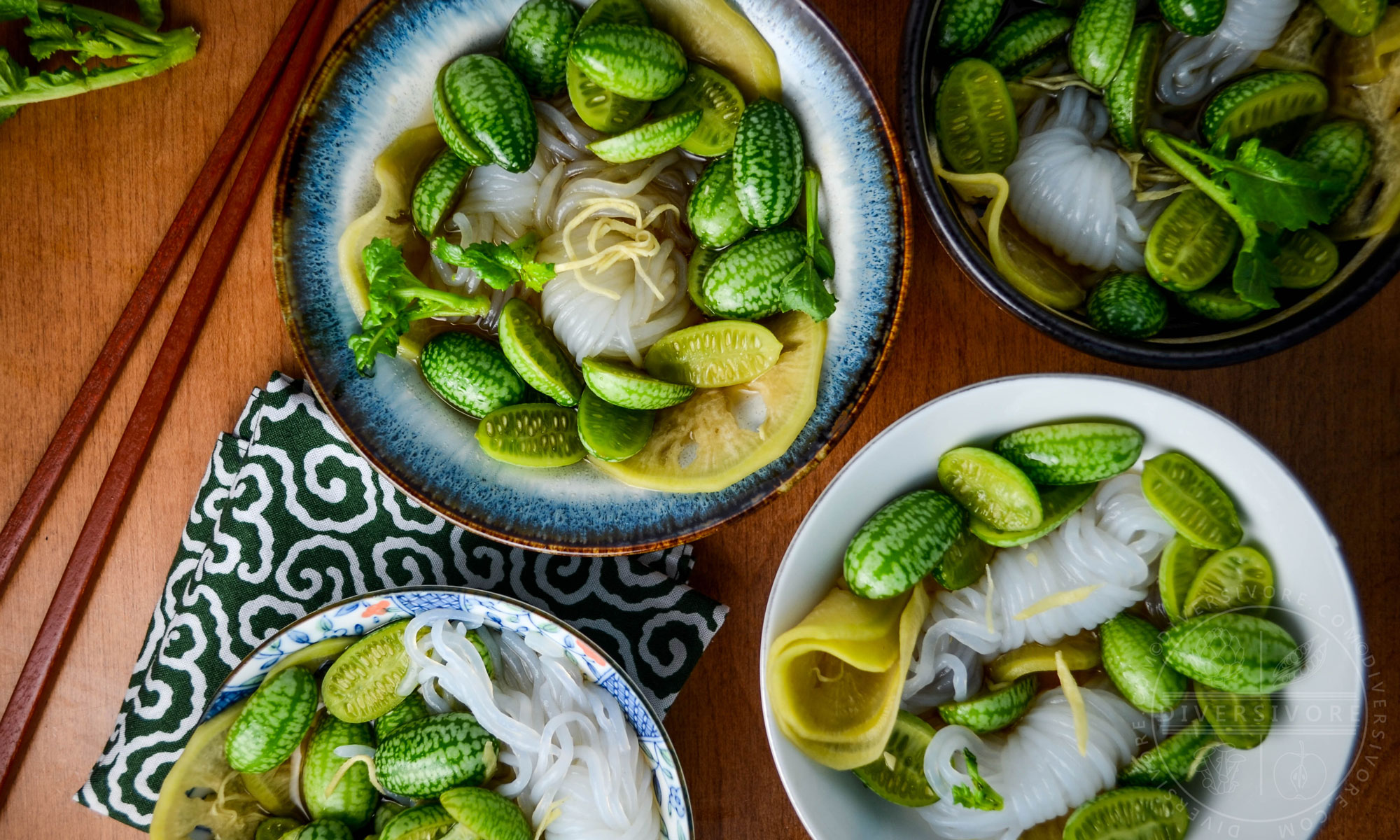 Bowls of cucamelon sunomono with chopsticks