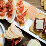 Pink Pearl apples and a charcuterie board with manchego, bison bresaola, smoked salmon, and endive - Diversivore.com