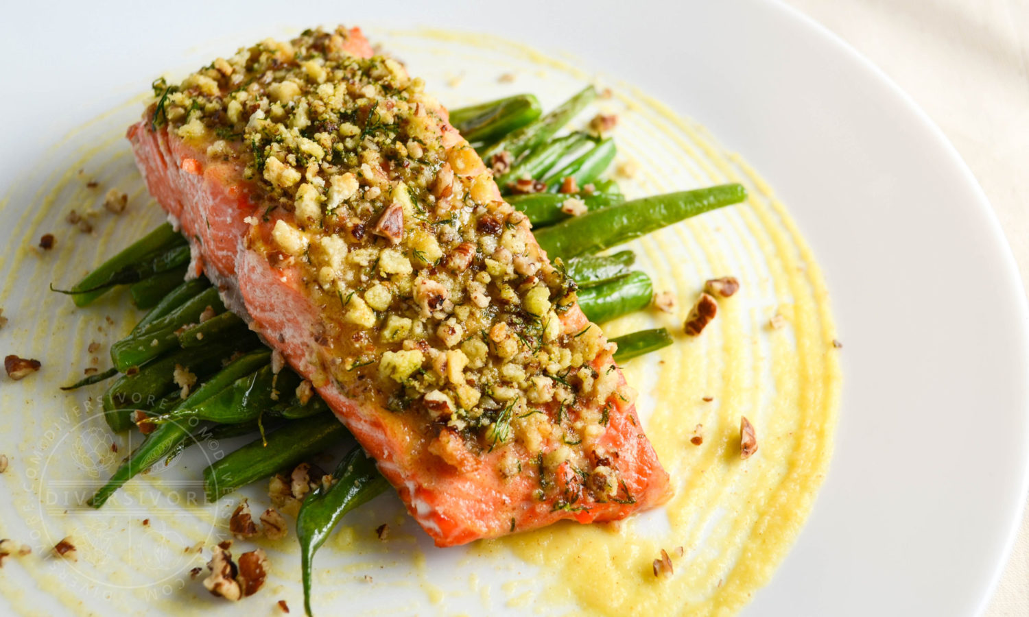 Honey and Dijon Baked Salmon with Pecans and Dill - served here with pan-fried buttered green beans - Diversivore.com