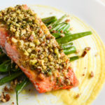 Honey and Dijon Baked Salmon with Pecans and Dill - served here with pan-fried buttered green beans - Diversivore.com