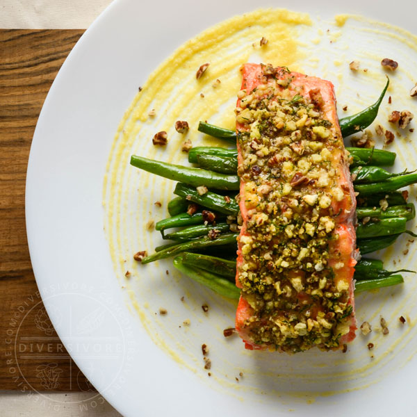 Honey and Dijon Baked Salmon with Pecans, served on a bed of green beans