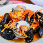 San Diego Mussel and Clam Linguine with coconut milk and squash blossoms - Diversivore.com