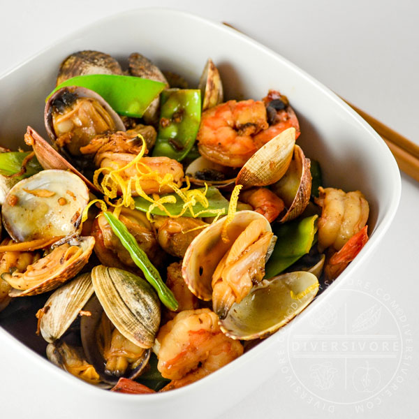 Stir-fried clams and shrimp with snow peas in a Chinese black bean and citrus sauce