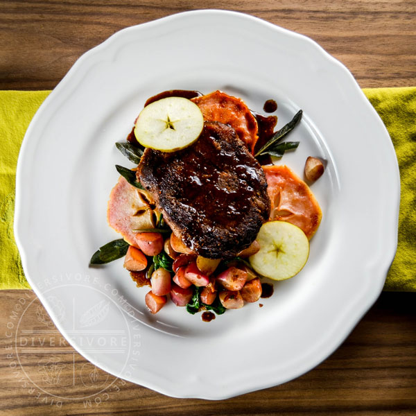 Pork neck steaks with apple, sage brown butter, and roasted radishes