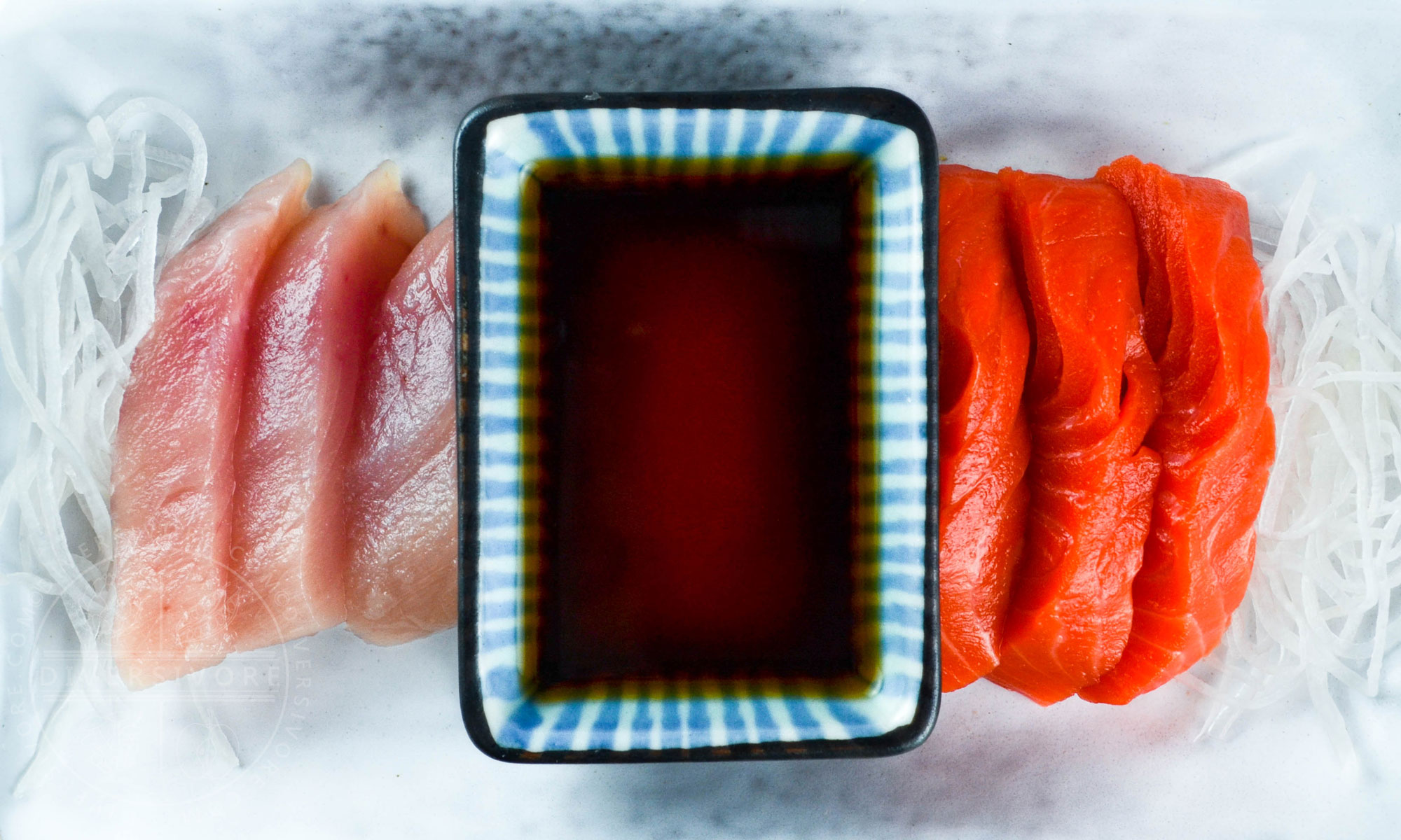 Ponzu shoyu with salmon and tuna sashimi