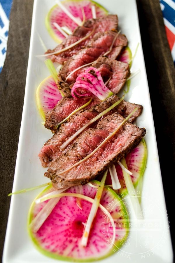 Slices of beef tataki, served with watermelon radishes and ponzu shoyu