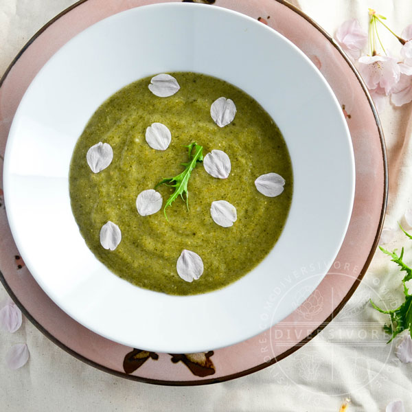 Japanese Nettle Soup, decorated with cherry petals and mizuna