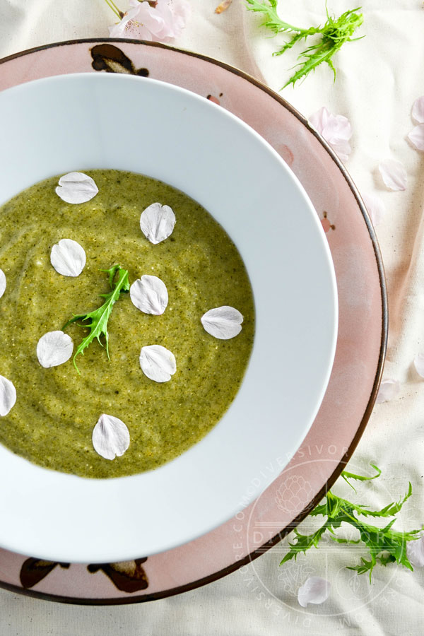 Japanese Nettle Soup, decorated with cherry petals and mizuna