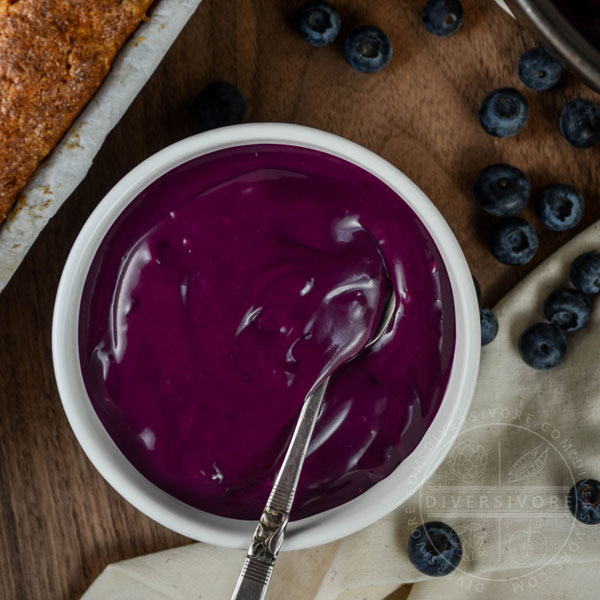Blueberry-lemon curd with a spoon