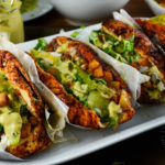 Pambazos con Huevos - perfectly messy Mexican stuffed sandwiches, drenched in guajillo sauce and fried - Diversivore.com