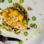 Halibut escabeche - cooked and marinated with olive oil, vinegar, garlic and jalapenos - Diversivore.com