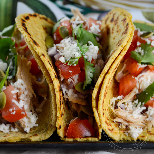 Tacos with pressure-cooked 'spent' stewing hen, tomato, cheese, and lime