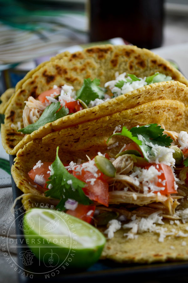 Tacos with pressure-cooked 'spent' stewing hen, tomato, cheese, and lime