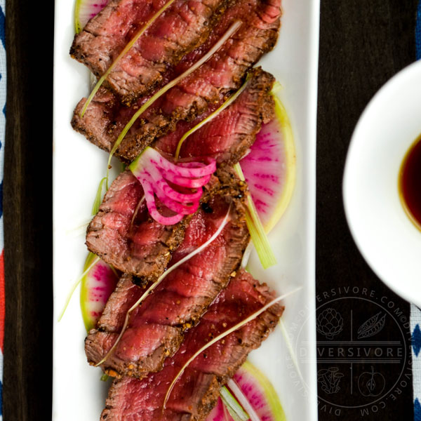 Slices of beef tataki, served with watermelon radishes and ponzu shoyu