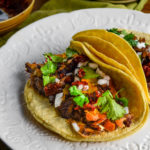 Pressure cooker Carnitas con Queso (tender beef bites with crispy melted cheese) - Diversivore.com