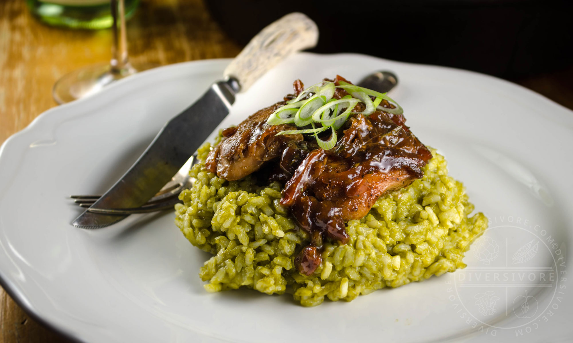 Marmalade and balsamic vinegar chicken on a bed of spinach risotto