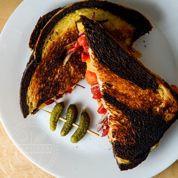Pickled Pepper Grilled Cheese on marble rye with cornichons