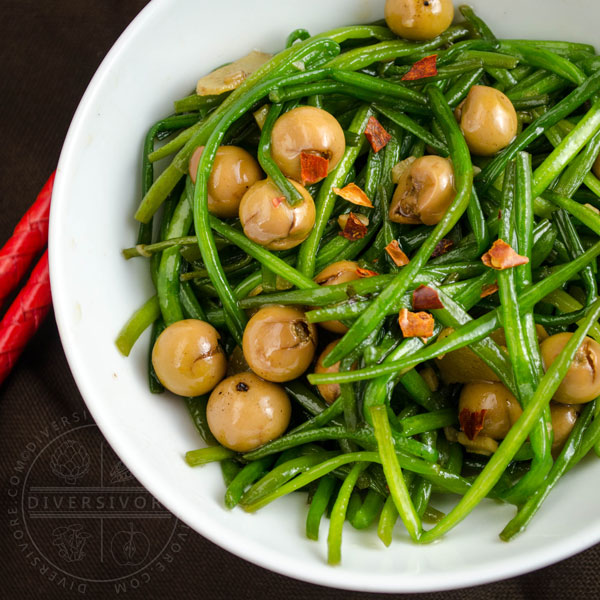 Stir-fried white water snowflake stems with po buzi (fragrant manjack), served in a white bowl