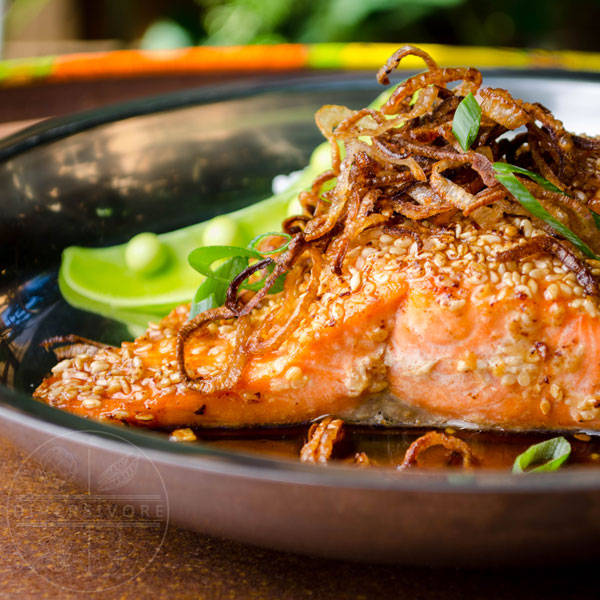 Sesame Salmon with Maple Soy Glaze, served with fried shallots and scallions