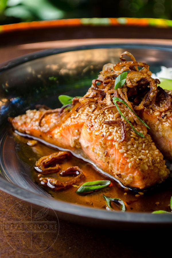 Sesame Salmon with Maple Soy Glaze, served with fried shallots and scallions