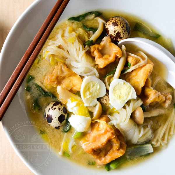 Kitsune Nabe - Japanese Stew with fried tofu, shimeji mushrooms, shirataki, chrysanthemum greens, and quail eggs