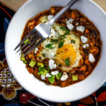 Shakshouka Rancheros - Eggs poached in a spiced tomato sauce, loaded with Mexican flavours and ingredients. - Diversivore.com