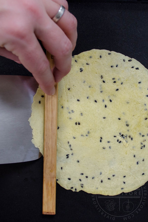 Rolling a Chinese crispy egg roll (biscuit roll) cookie - step 1