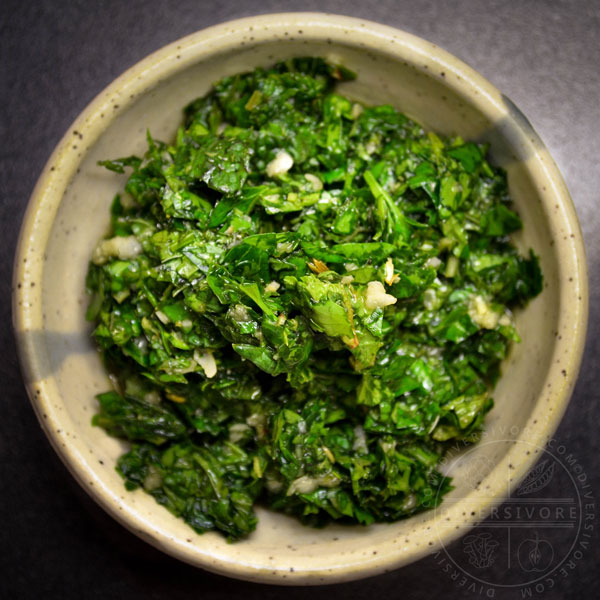 Mint chimichurri in a small stoneware bowl