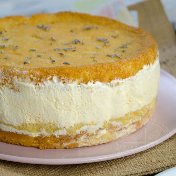 Lemon, Lavender, and Honey Semifreddo Cake on a pink plate against a burlap cloth