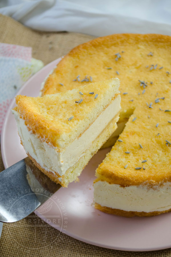Lemon, Lavender, and Honey Semifreddo Cake with a slice being lifted out by a cake server