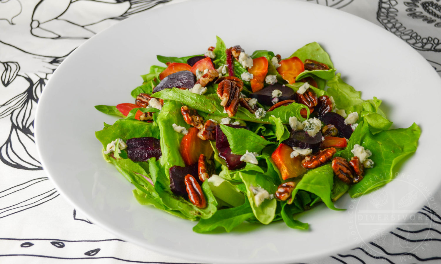 Dandelion and butterleaf lettuce salad with roasted beets, blue cheese, and maple-candied pecans - Diversivore.com