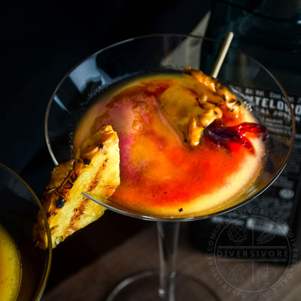 Mezcalita del Ocaso - Mezcal cocktail with grilled pineapple, chili, and hibiscus agua fresca