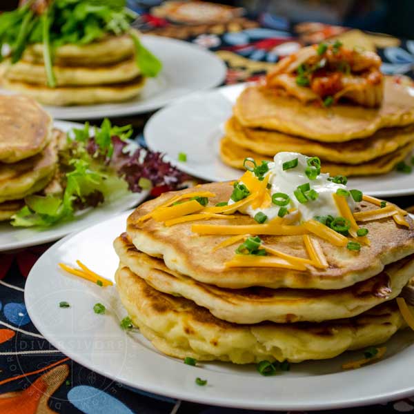 Savoury pancake variations on white plates