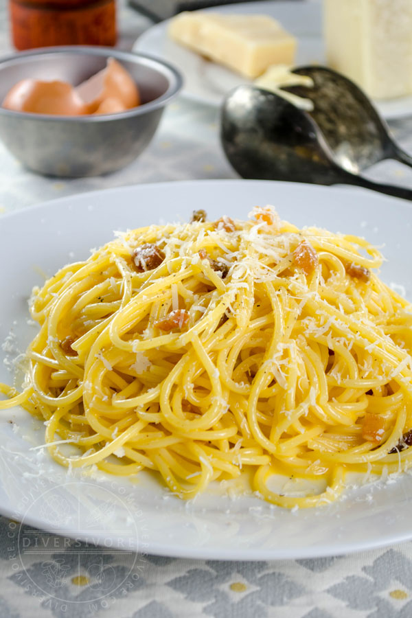 Spaghetti Carbonara with guanciale on a white plate