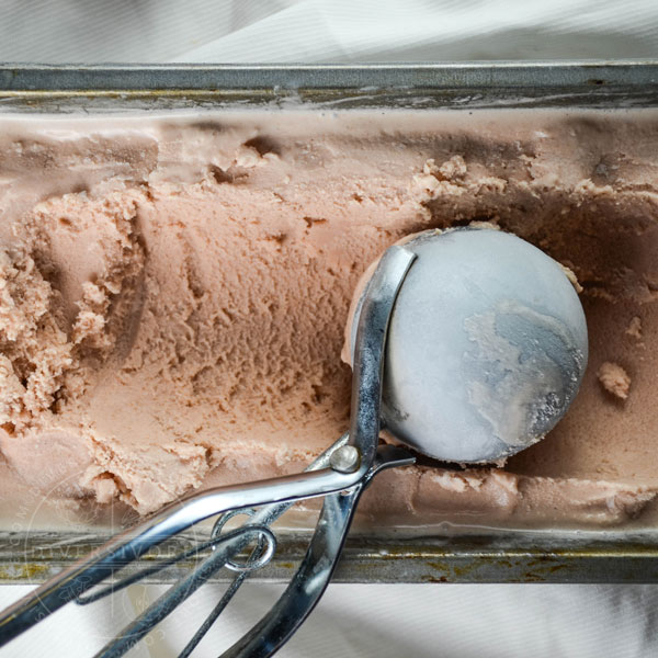 Cranberry-Chai Ice Cream with an ice cream scoop