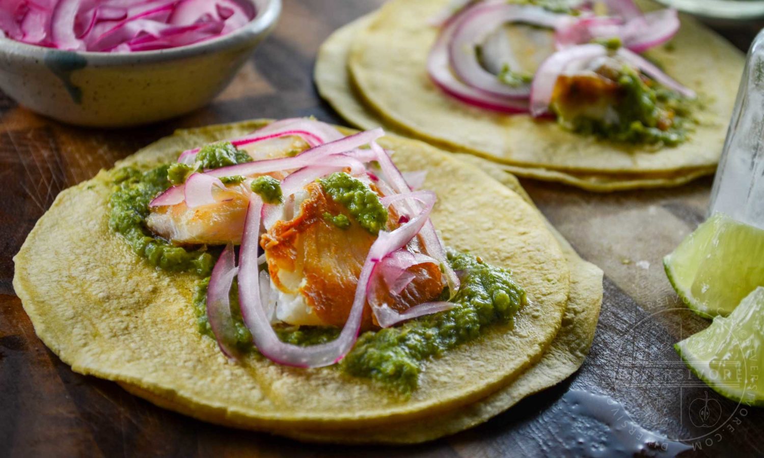 Halibut cheek tacos with roasted corn, garlic, and cilantro salsa and pickled red onions - Diversivore.com