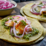 Halibut cheek tacos with roasted corn, garlic, and cilantro salsa and pickled red onions - Diversivore.com