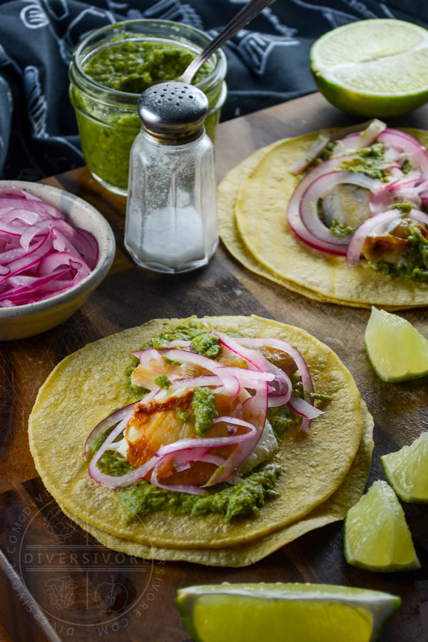 Fish tacos with cilantro corn salsa and pickled red onions