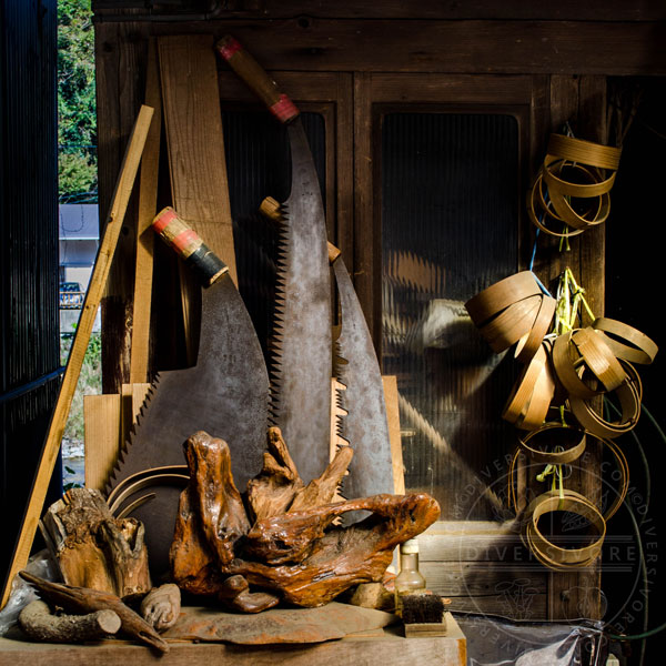 Large saws and various woodworking implements at a small carpenter's shop in Umaji, Kochi, Japan