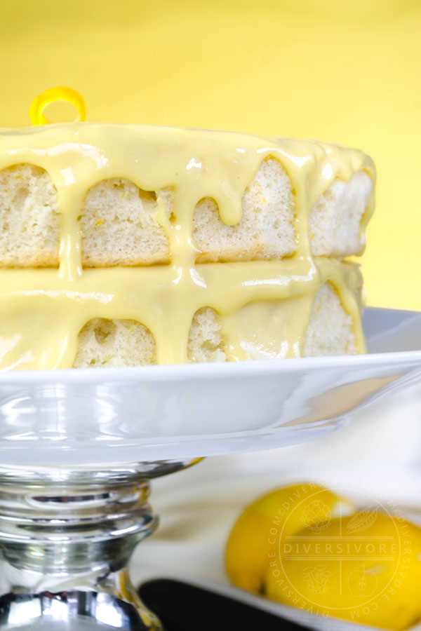 Lemon Whip Cake with Dairy-Free Lemon Curd on a white cake plate with a metal stand