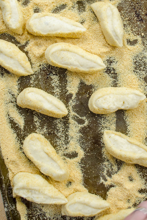 Pandesal cut and dipped in breadcrumbs