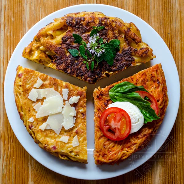 Three types of frittata di pasta (frittata di maccheroni) on a white plate with toppings