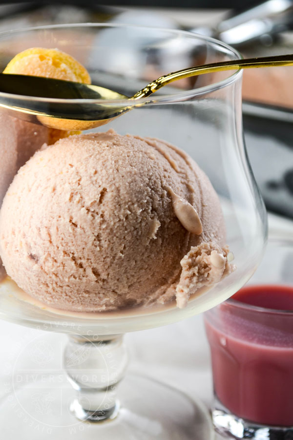 Cranberrry Chai Ice cream served with lady fingers and a shot of cranberry chai affogato