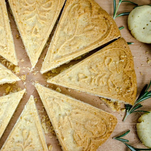 Rosemary grapefruit shortbread cut into decorative wedges